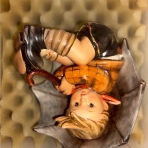 Charming Boy Figurine with Umbrella